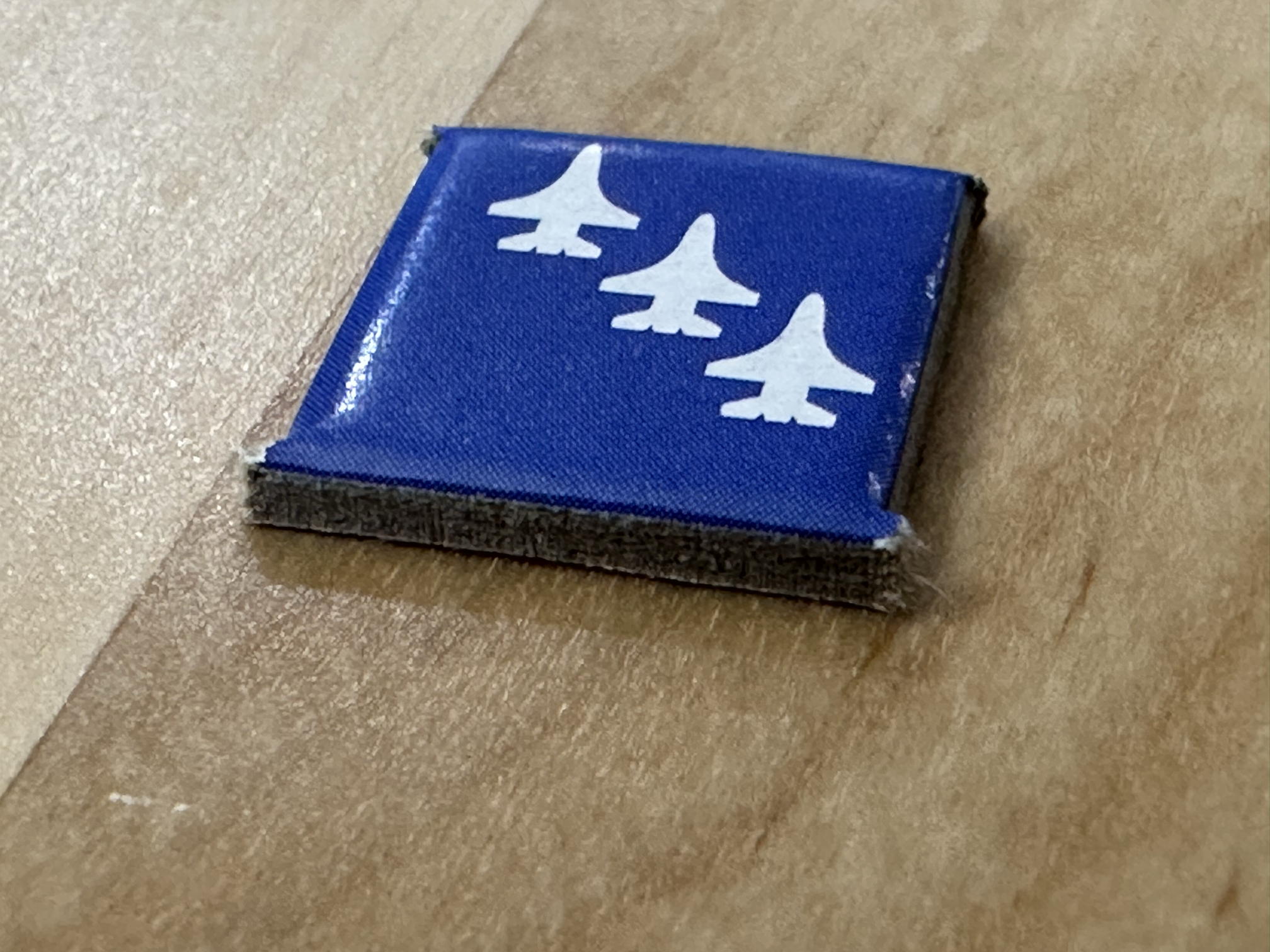 A picture of a cardboard counter with a nib