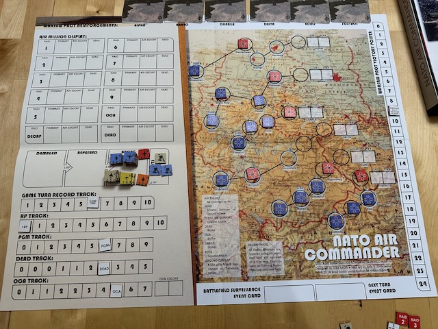 A mid-game picture of NATO Air Commander, with several major cities in trouble