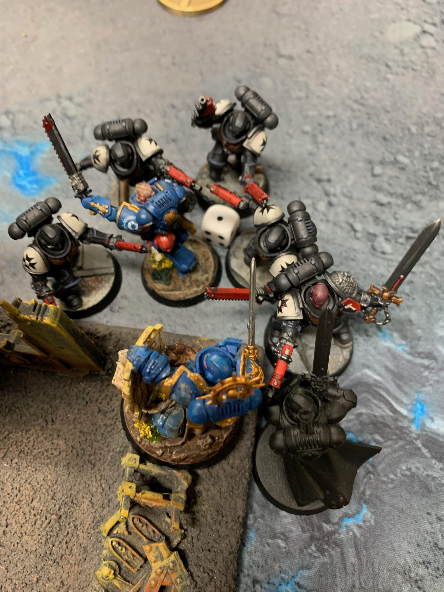 Black Templar and Ultramarine Space Marines in melee combat